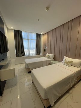 Chambre 1 de l'appartement Hilton N°1
